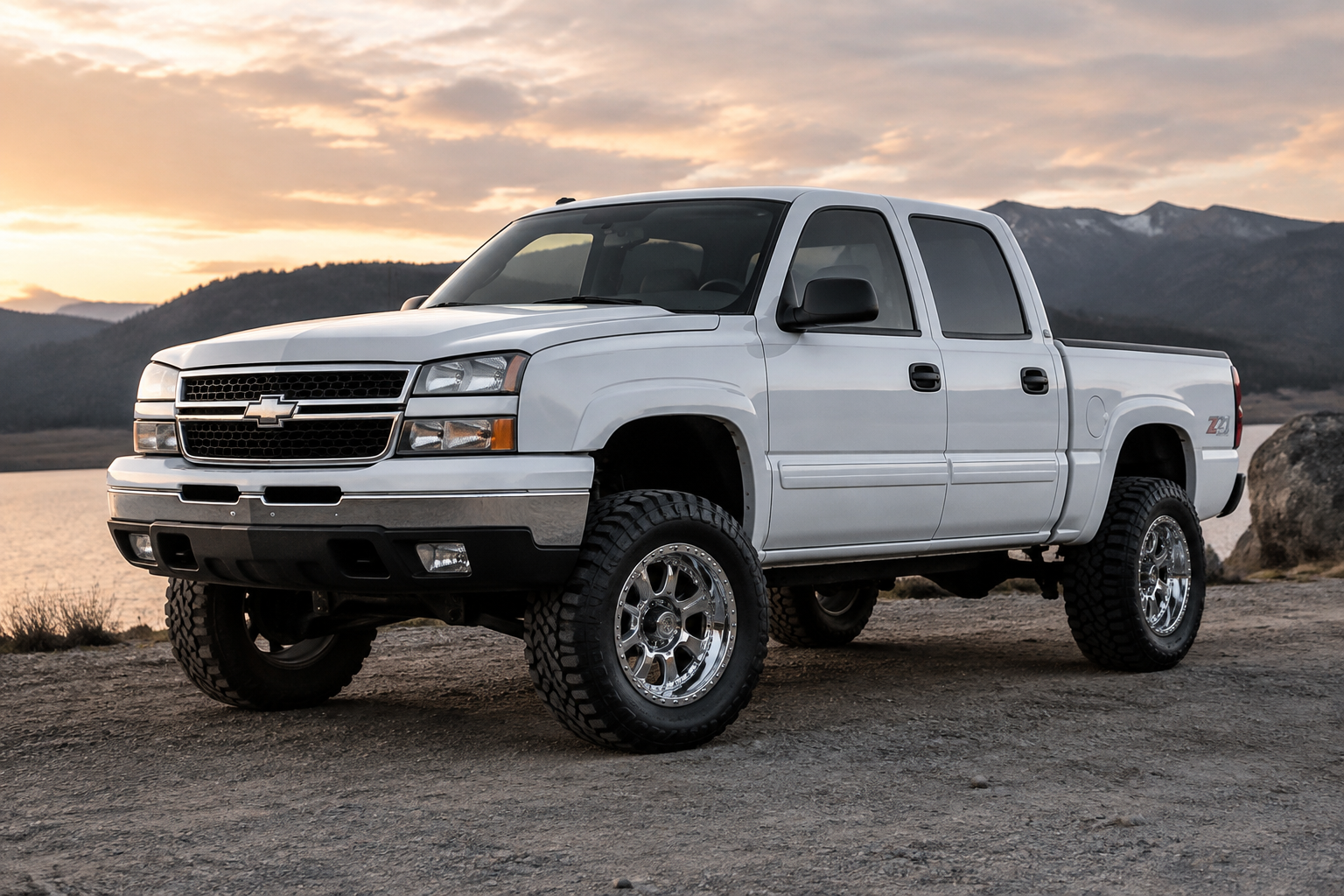 White 2005 Chevy Silverado with a 3 inch lift, 17 inch chrome beadlock rims, ...