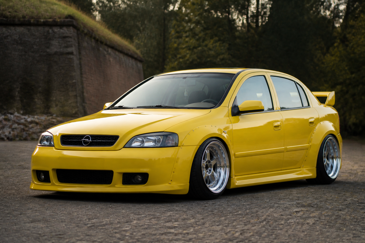 Opel astra g sedan with widebody kit and make it yellow and put some wheels w...