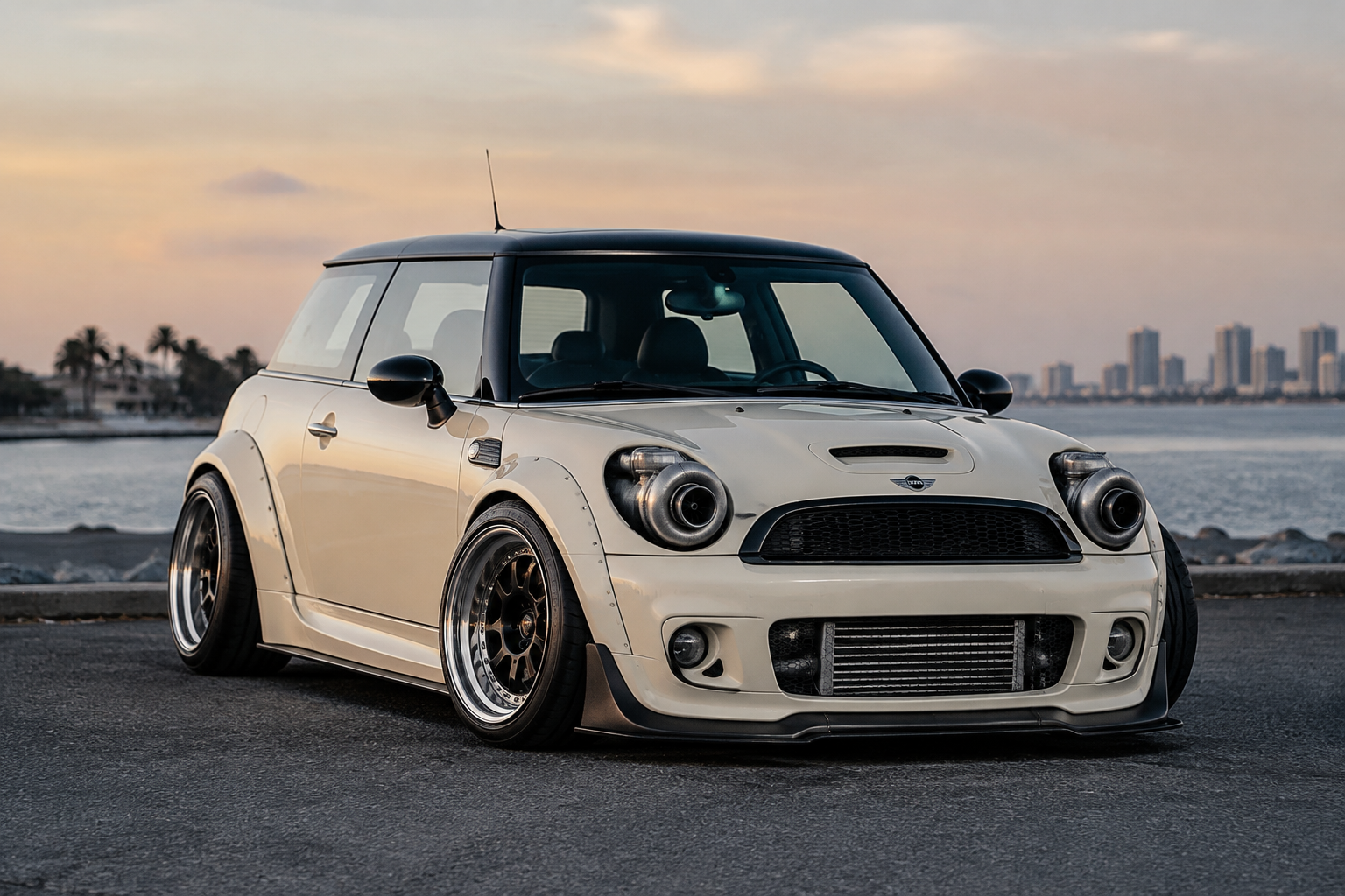 Do a 2009 cream color mini cooper s slammed with turbos installed where the h...